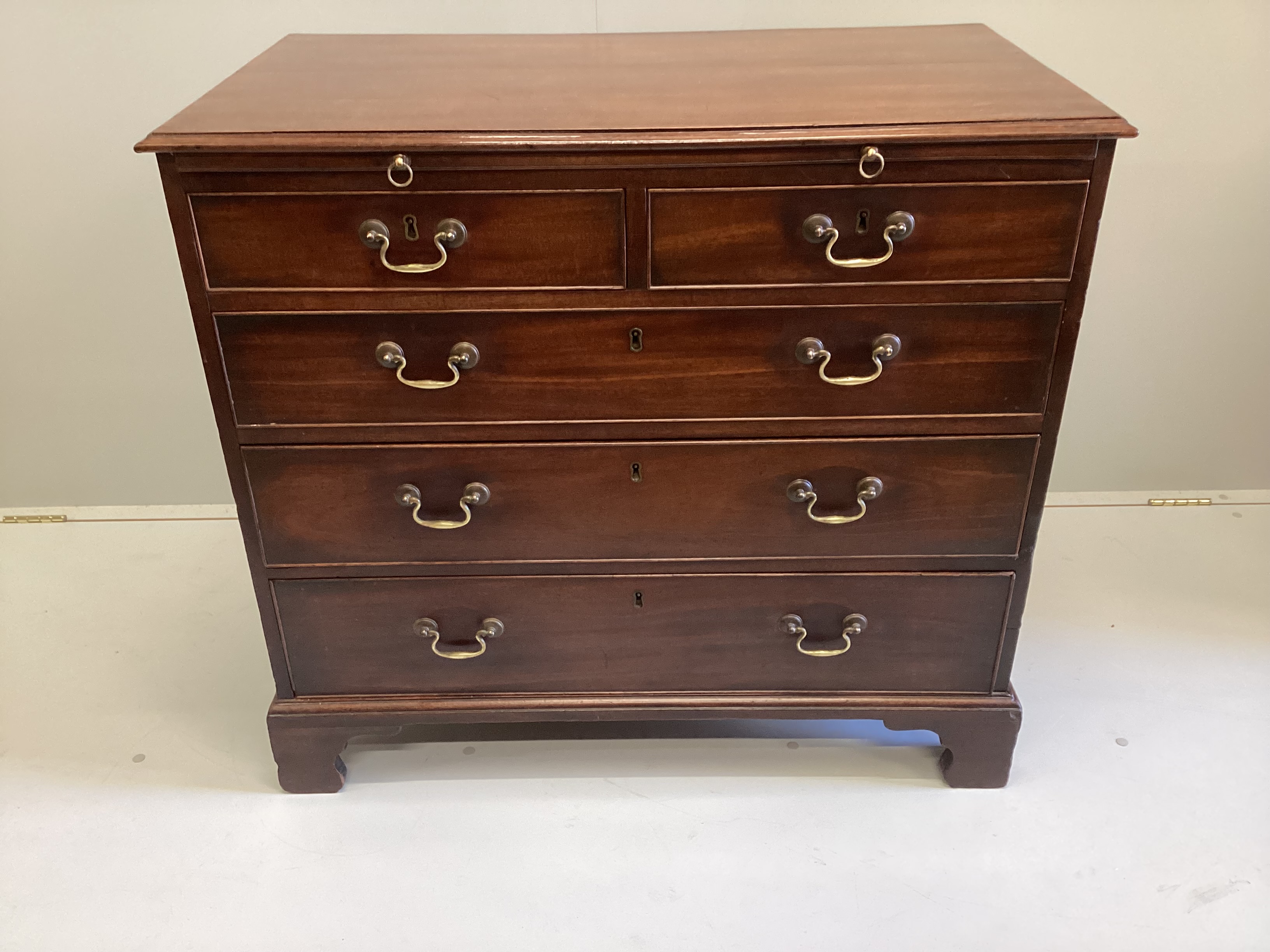 A George III mahogany chest fitted slide, width 92cm, depth 51cm, height 83cm